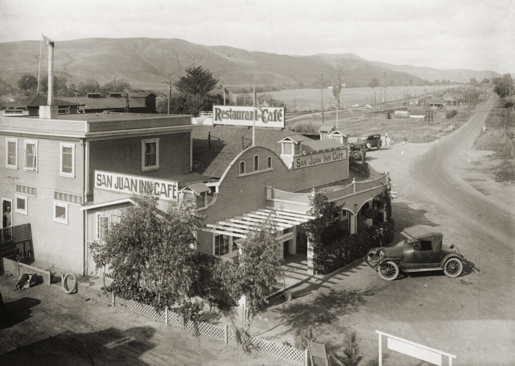 black and white photo of cafe alongside dirt road in San Juan Capistrano, California