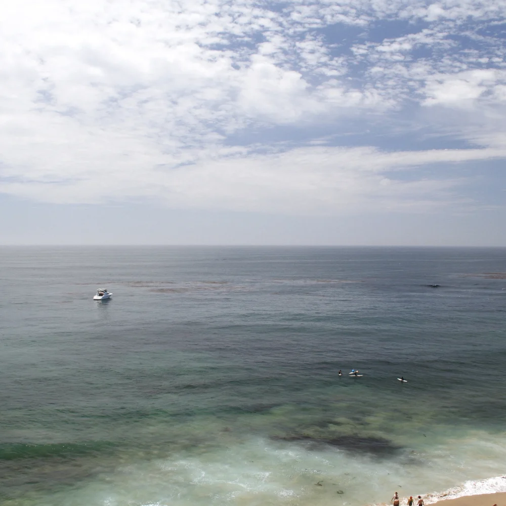 emerald green pacific ocean beach scene