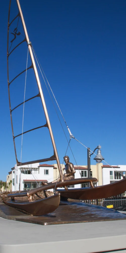 bronze sculpture of hobiecat sailcraft