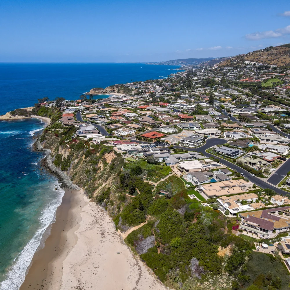 Aerial view of Californian coastal development & beach