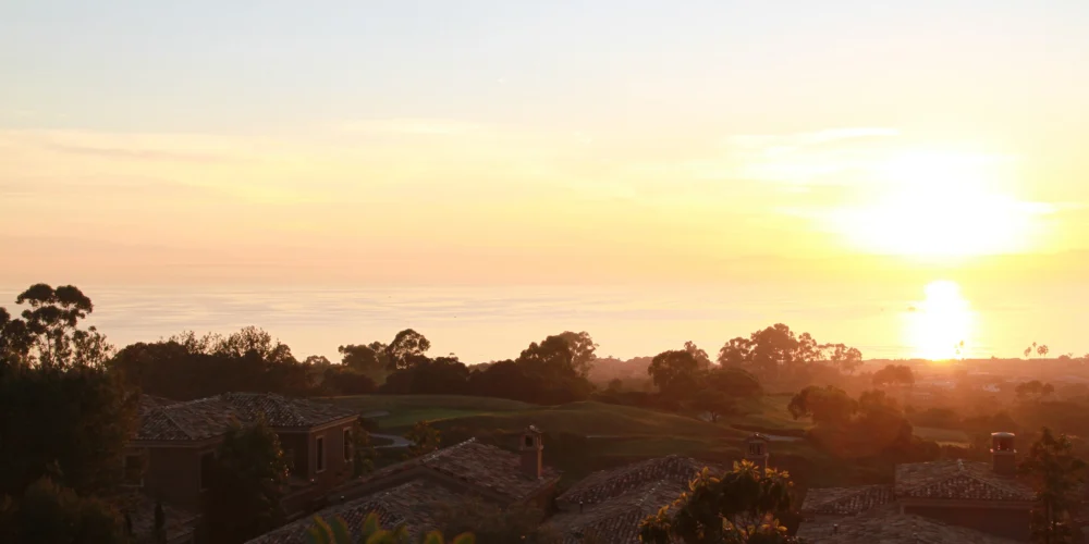 sunset over exclusive golf course