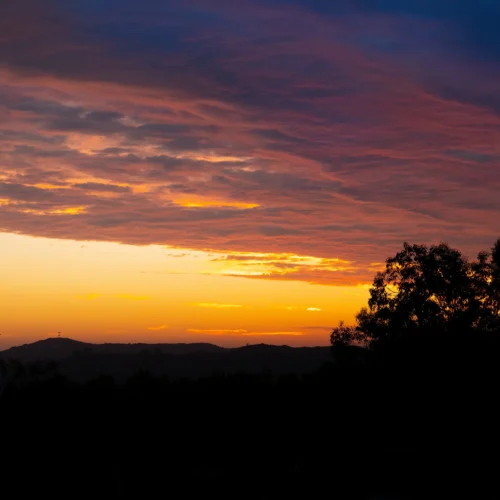 multicolored sunset over southern californian natural landscape ridgeline