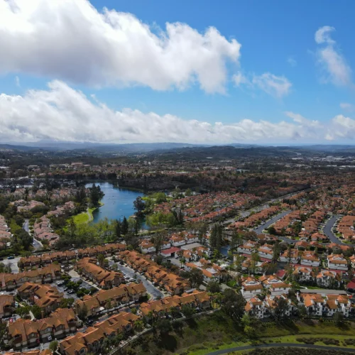 aerial photo of southern californian planned community with lake